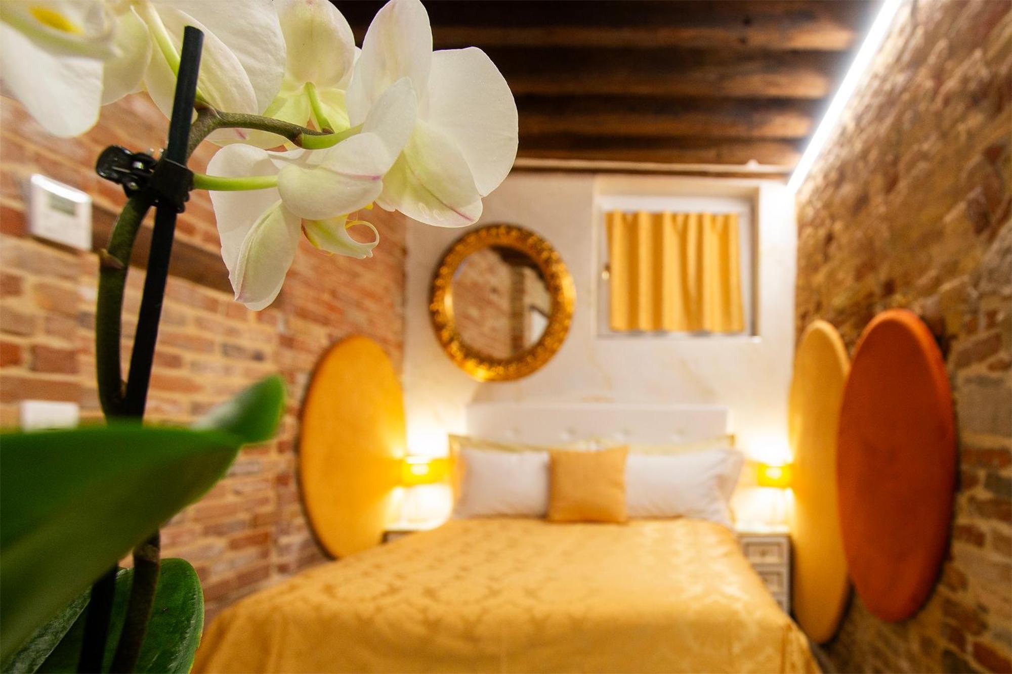 Capatron Hotel Venesia Bagian luar foto