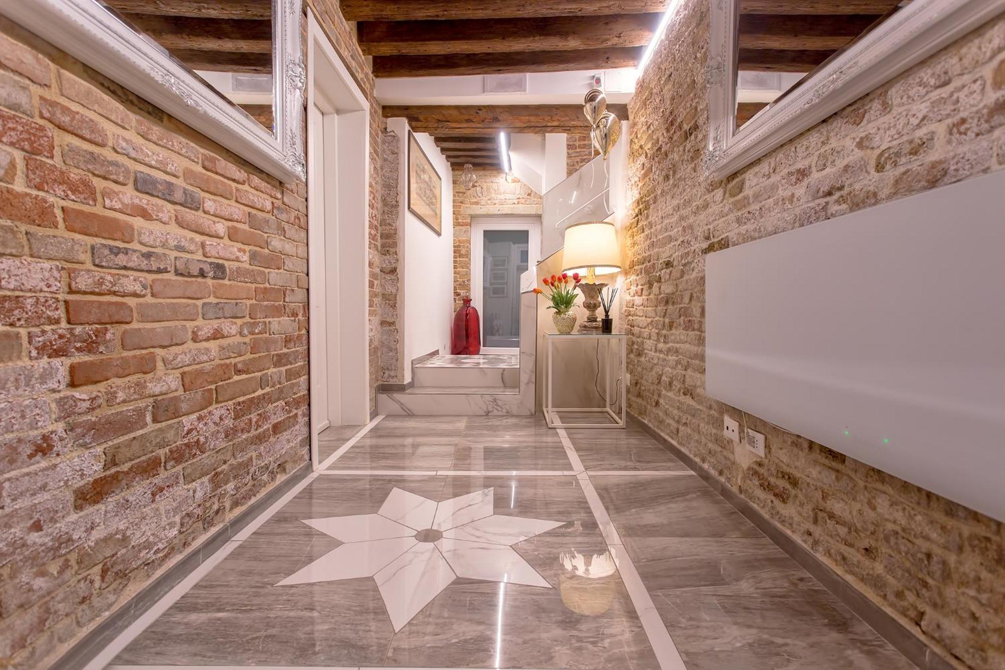 Capatron Hotel Venesia Bagian luar foto